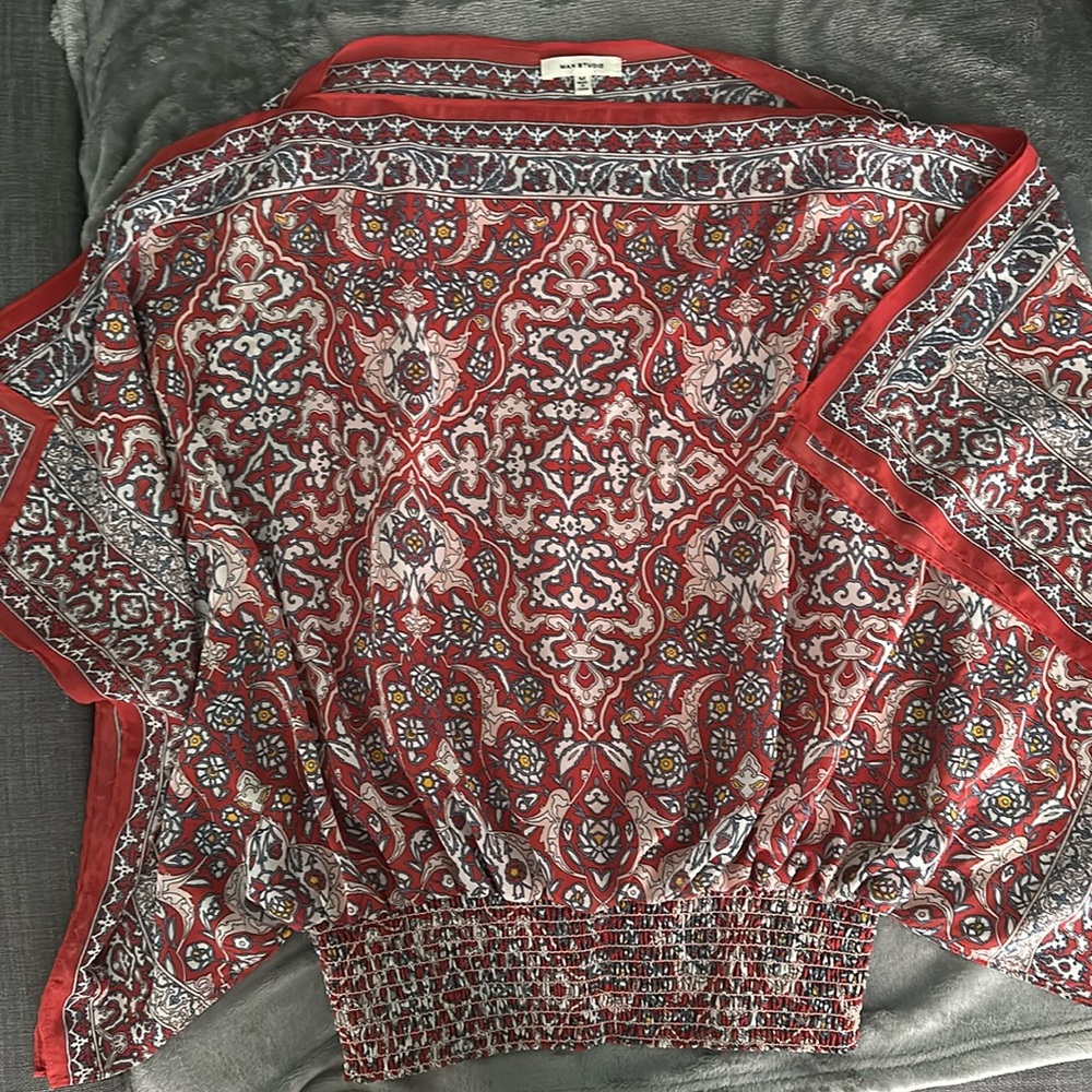 Max Studio rayon red with floral and paisley designs.
